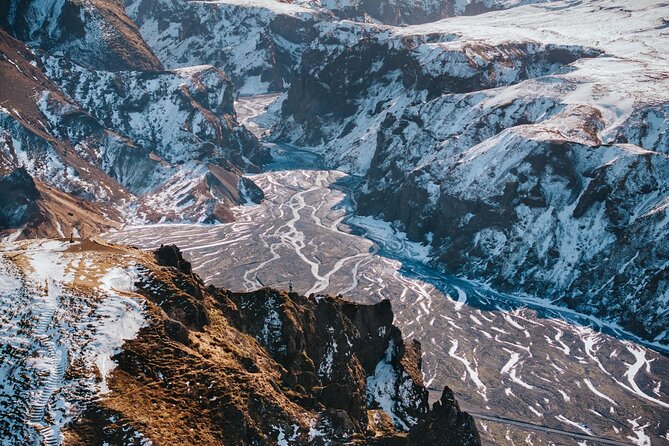 4 Day Northern Lights Adventure - Ice Caves & 4x4 Super Jeeps - Katla Ice Caves and Reynisfjara black sand: volcanic terrain in winter light