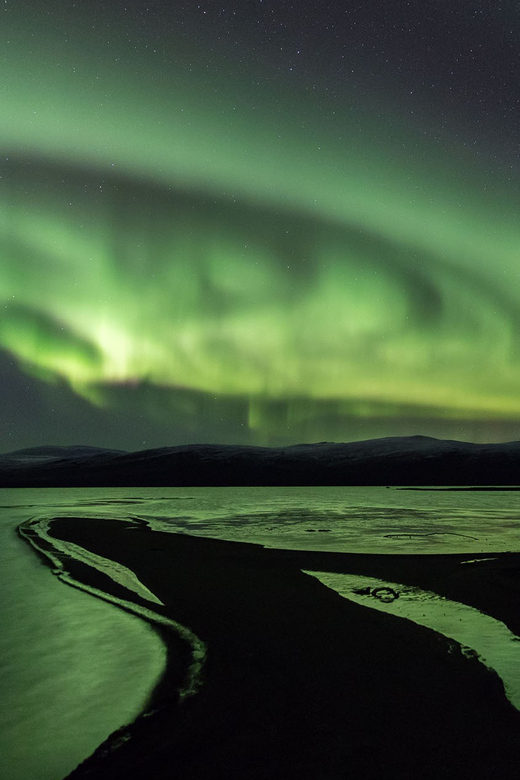 Abisko: Guided Autumn Aurora Chase with Hotel Transfers - Aurora chasing around Abisko National Park in autumn