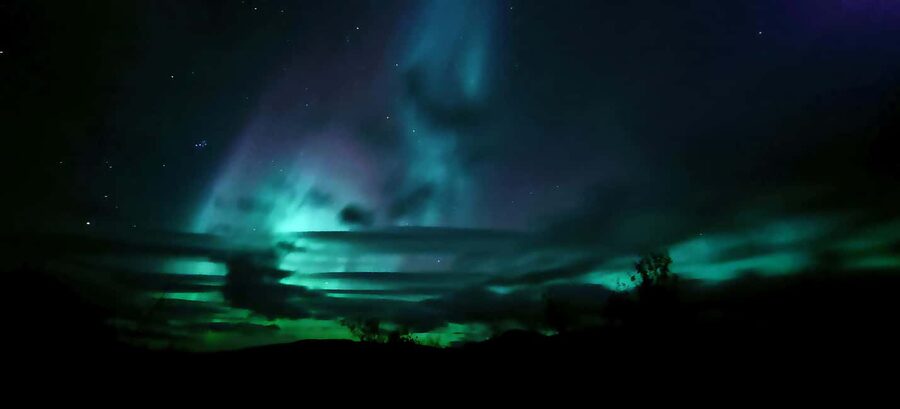 Abisko: Northern Lights Hike with Husky Puppies - Sámi-Style Tipi Warm-Up: Fire, Hot Drinks, and Arctic Stories