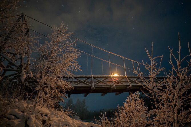 Aurora Borealis Snowshoeing Adventure by Night from Rovaniemi - Lapland by night: forests, a hidden lake, and hilltop views