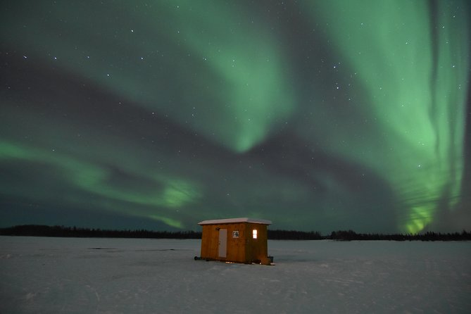 Aurora Borealis Viewing and Ice Fishing Adventure - Entering the warm cabin: comfort is the whole strategy