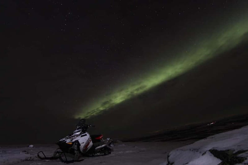 Aurora Hunt on Snowmobile - small groups - How the Kiruna aurora hunt stays fun even if clouds move in