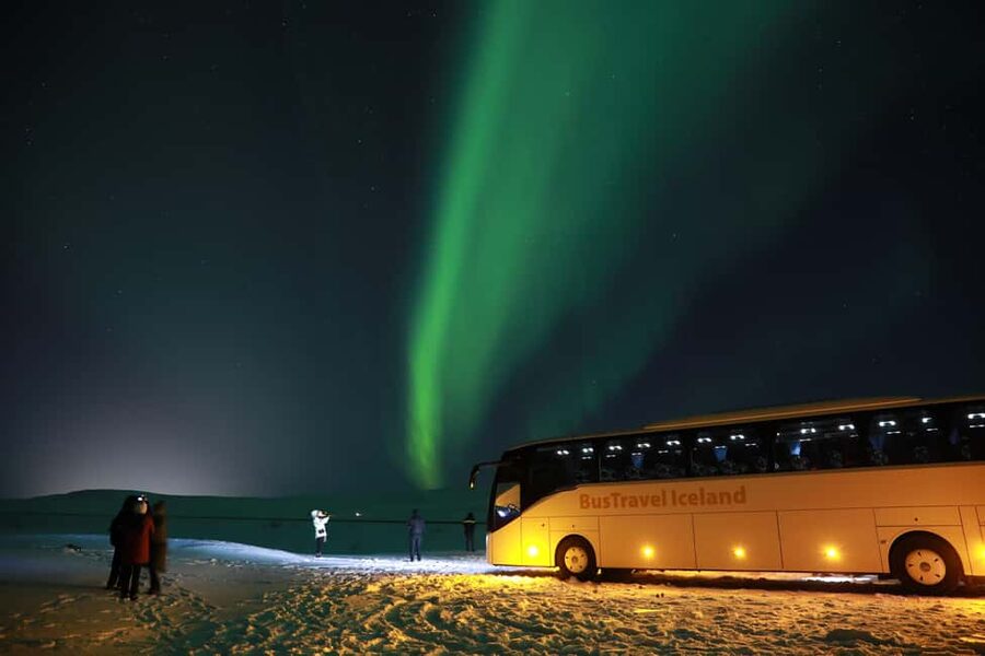 From Reykjavik: Northern Lights Bus Tour with Hot Cocoa - Stops you’ll actually use: where you wait, where you photograph