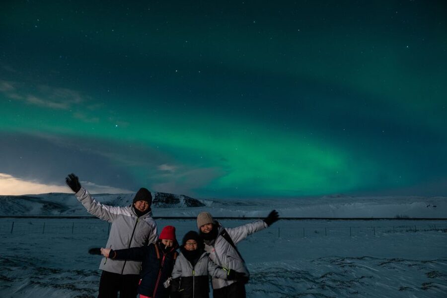 From Reykjavik: Northern Lights Guided Tour with Photos - Comfort in the cold: blankets, hot drinks, and what to wear
