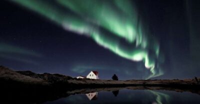 From Reykjavík: Northern Lights Tour with Hot Cocoa & Photos - The Aurora Hunt: Leaving City Lights and Chasing Clear Skies
