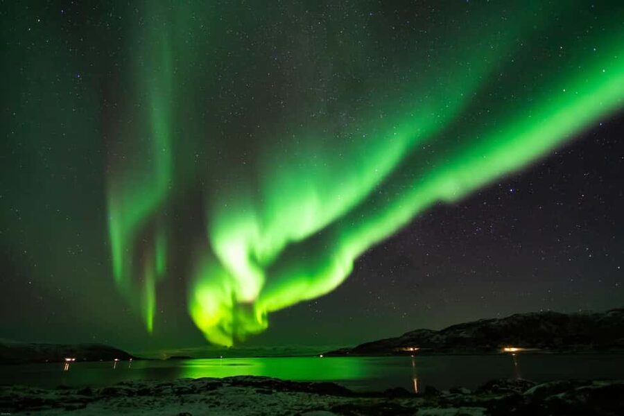 From Tromsø: Northern Lights Chase - Camp time: warmth, snacks, and Sami Northern Lights stories