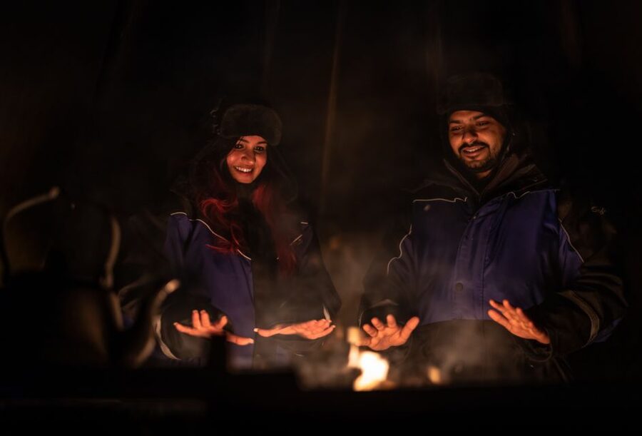 Ivalo: Lake Inari Northern Lights Tour w/ Reindeer & Dinner - The Snowmobile-Pulled Sleigh Across the Frozen Lake