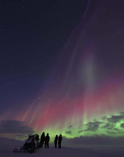 Kilpisjärvi: Northern Lights Snowmobile Tour with Photos - Silence under the stars: how the aurora time is actually used