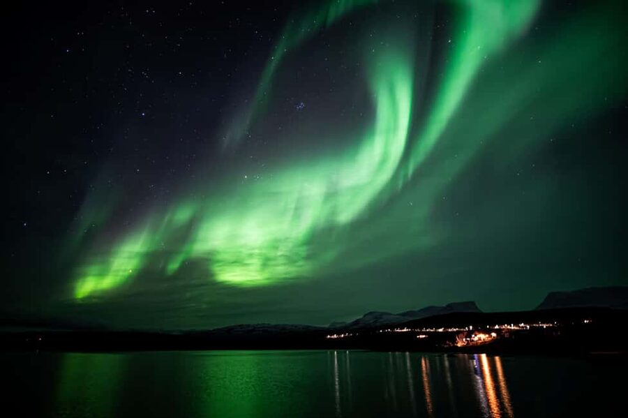 Kiruna: Aurora Wayfinding with Hidden Histories - Warm bus + fika: a comfort system, not a bonus