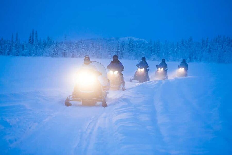 Kiruna: Northern Lights Snowmobile Tour with Dinner - Getting on the snowmobile: gear, safety, and who drives