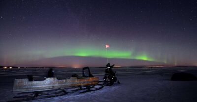 Luleå : Northern Lights Tour on a Snowmobile drawn Sled - The Sled Comfort Factor: Reindeer Pelts, Blankets, and Warm Gear