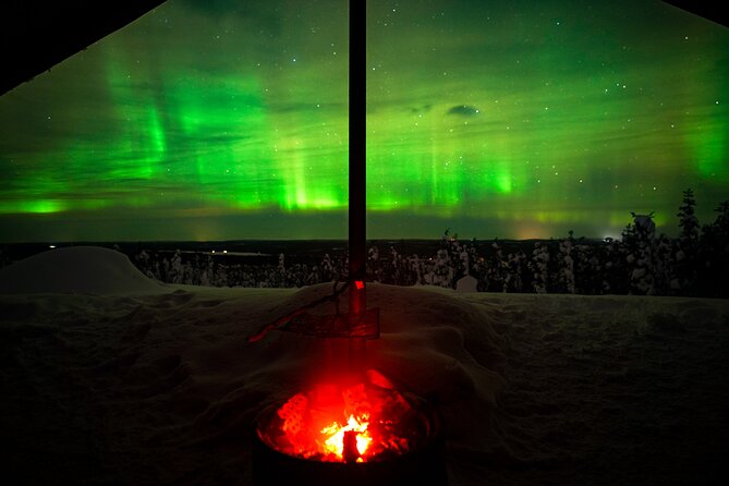 Night Snowshoeing Adventure under the Northern Lights - Campfire warmth and Finnish fire-starting with flint & steel