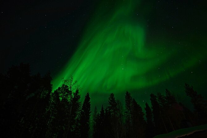 Northern Lights Hunting in Lappish old cottage - What the Guide Does Beyond Pointing at the Sky