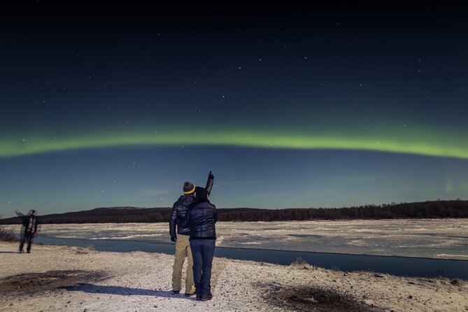 Northern lights hunting photo tour with bbq; small groups - Why Rovaniemi at 8:30 pm is the right setup for aurora hunting