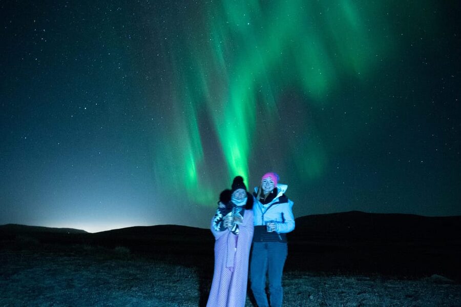 Northern Lights in Mini Bus, Photos, Hot Cocoa and Pastries - A 4-hour Northern Lights mission from Reykjavik’s glow