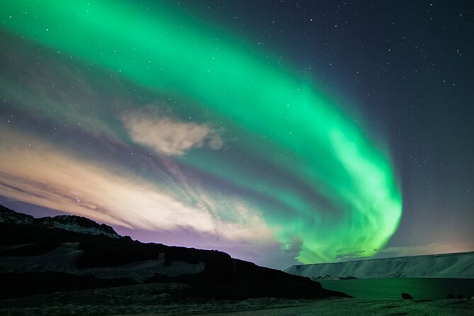 Northern Lights Minibus Tour with Hot Cocoa, Blankets & Photos - When the lights finally show: hot cocoa, blankets, and photos