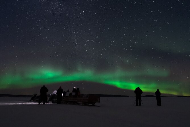 Northern lights tour to Lake Inari from Ivalo, Reindeers & Dinner - The Snowmobile-Pulled Sleigh Ride: Cozy Cold in Motion
