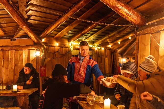 Reindeer Camp Dinner with Chance of Northern Lights in Tromso - Feeding the herd: up-close reindeer time in the snow