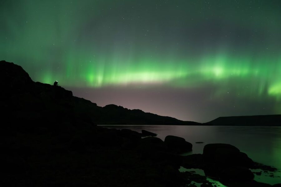 Reykjavík: Northern Lights Minibus Tour with Photos - The Drive Out: Countryside Dark and a Stop to Get Oriented
