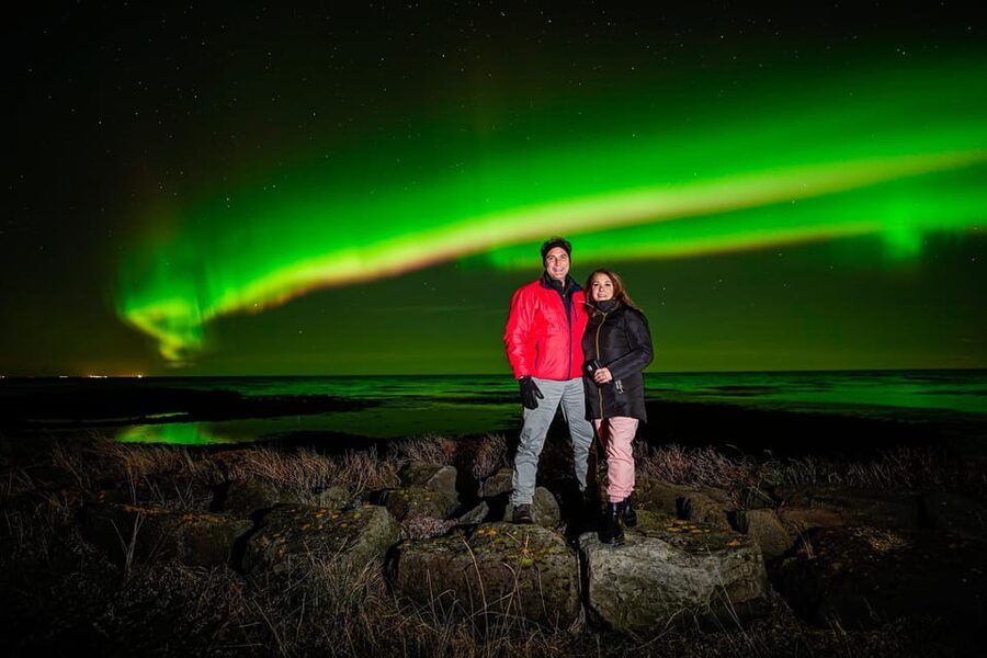 Reykjavik: Northern Lights Tour with Private Photographer - Warm jumpsuits and outdoor chairs: small comfort, big payoff