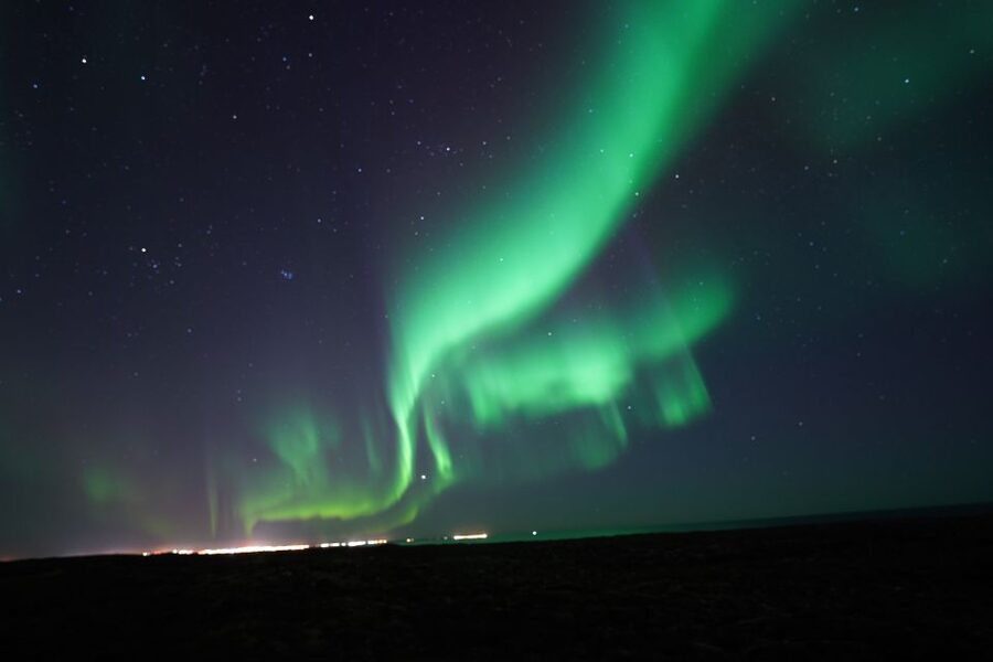Reykjavik: Premium Northern Lights Tour with Free Photos - Iceland lessons while you wait: the guide experience