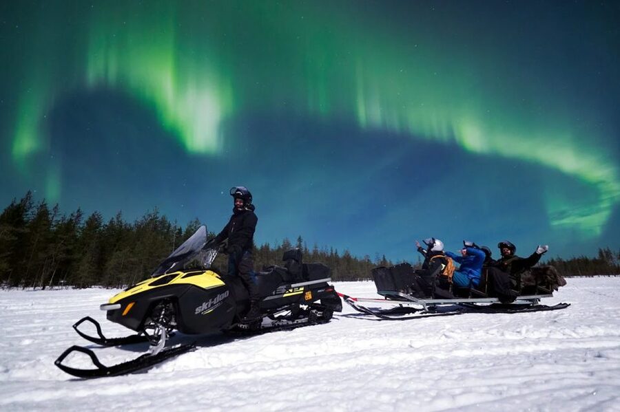 Rovaniemi: Northern Lights Sleigh Ride - The snowmobile sleigh ride: fast fun, real cold-weather comfort