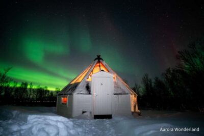 Tromsø: Aurora Crystal Lavvo Overnight Stay with Activities - Entering Aurora Wonderland Basecamp: low light and immediate lavvo anticipation