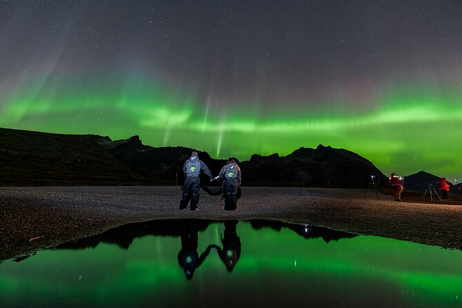 Tromsø Fjordland Aurora Chase Northern Lights by the Arctic Sea - Campfire warmth: grilled corn, marshmallows, and hot chocolate