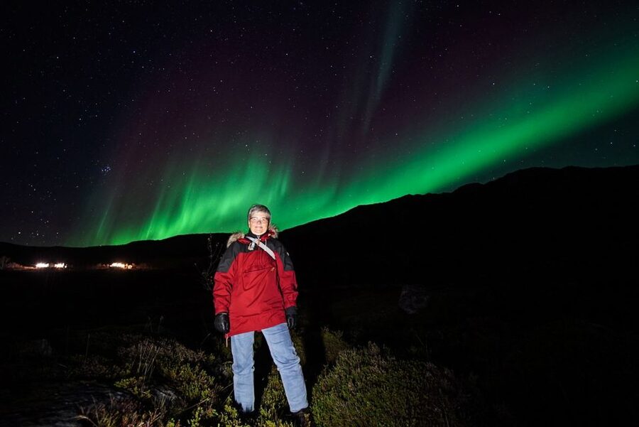 Tromsø: Northern Lights Chase Minibus Tour - Warm drinks, thermal suits, and what the bonfire really means