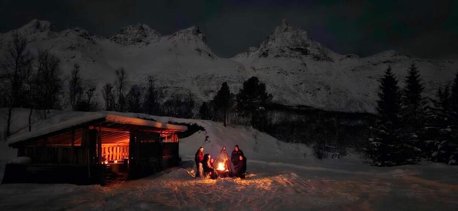 Tromsø: Northern Lights Hunt. Local Guide and Basecamp. - Magic Ice Bar meeting point: the start of your “gear first” night