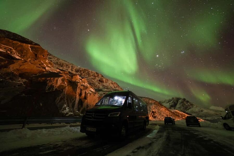 Tromsø: Northern Lights tour with local experts - The Warm-Arctic Setup: Thermal Suits, Snacks, and Campfire Comfort