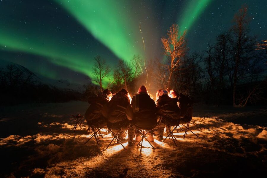 Tromsø: Northern Lights Trip with Campfire and Snacks - Leaving the city: how the tour improves your odds of seeing the aurora