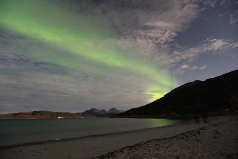 Tromsø: Small Group Northern Lights Hunt - When the sky finally clears: campfire waiting that feels worth it