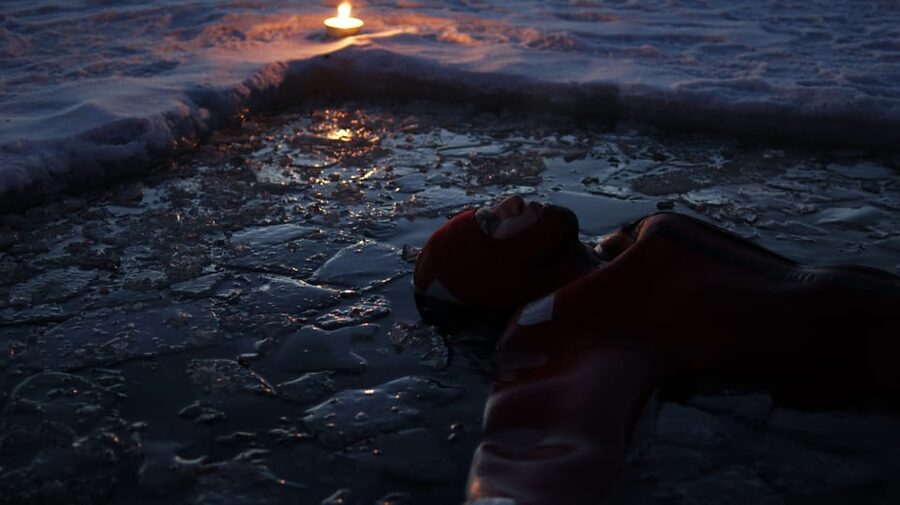 Ylläs: Northern Lights Ice-Floating Experience with Transfer - Ice hole floating: what the experience feels like step by step